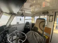 Bateau-pompier à vendre